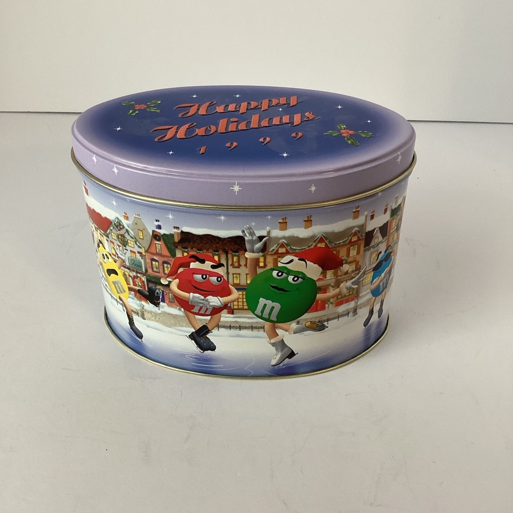 M&M: 1999 Christmas village tin canister series skating rink number 09 vintage